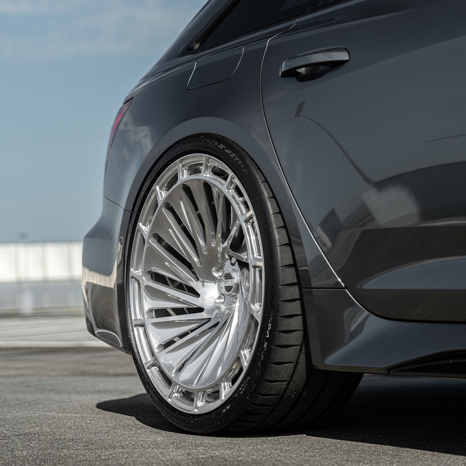 Audi RS6 C8 rear three-quarter view featuring Radi8 R808 23 inch forged rims in silver